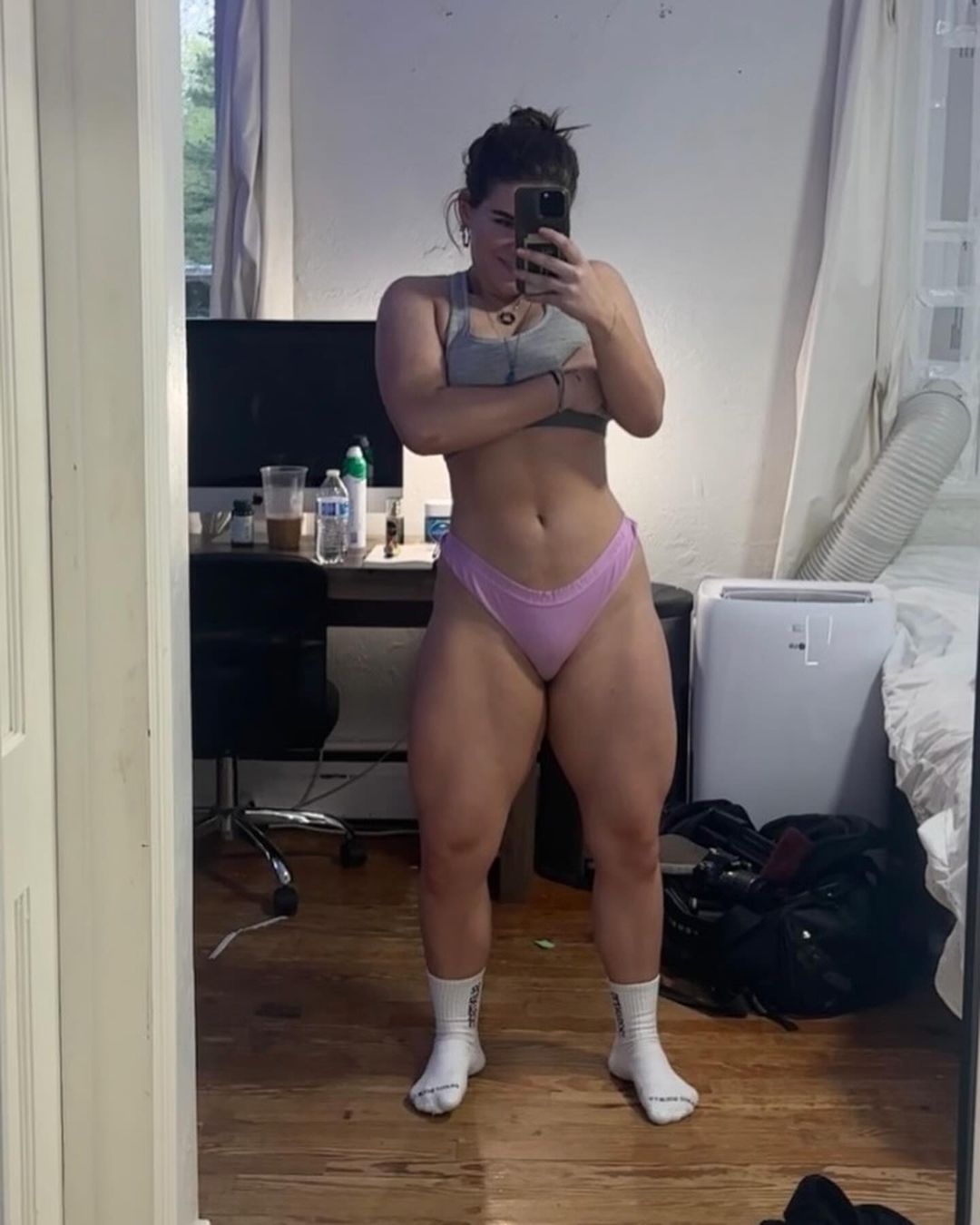 Confident pose in gym